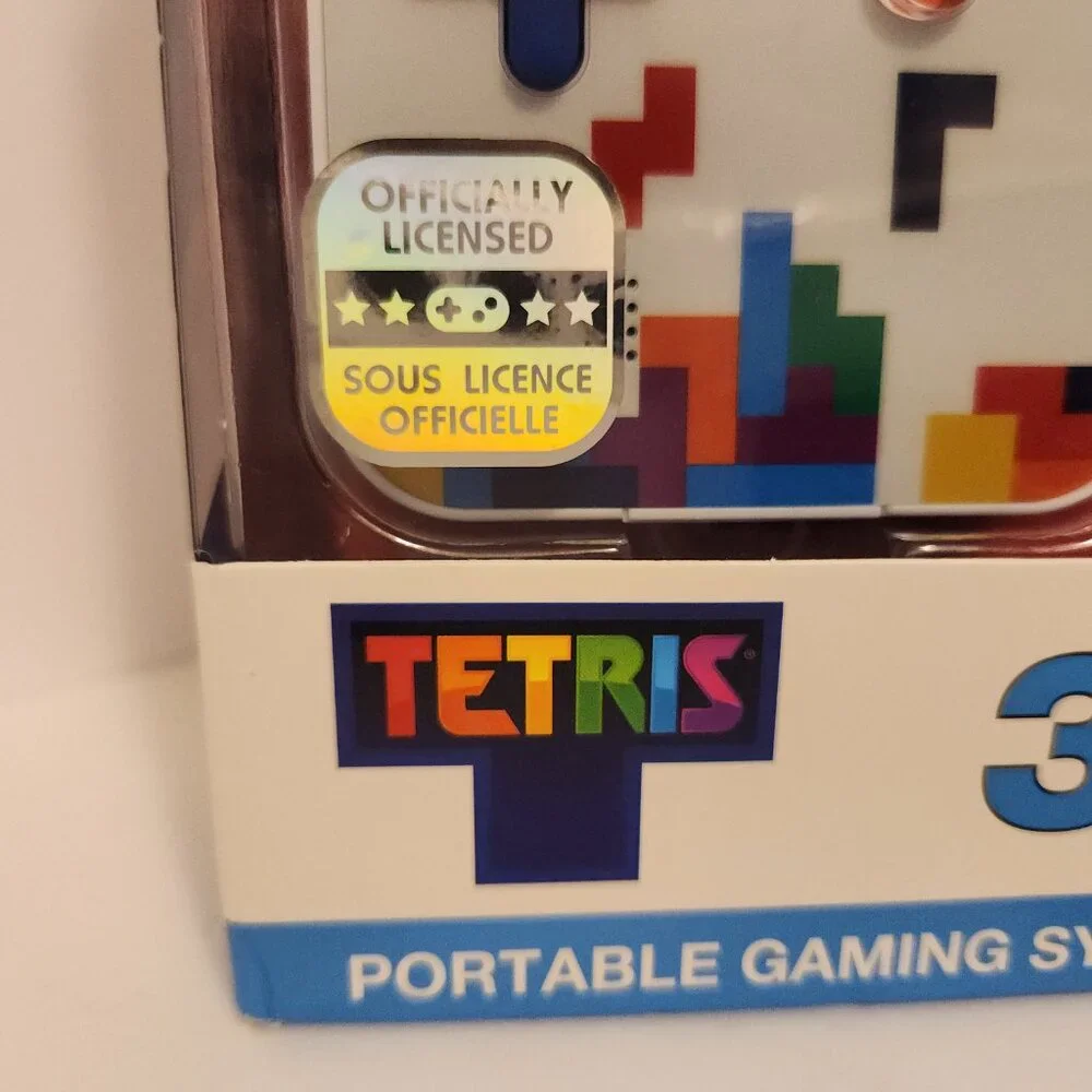 TETRIS Go Gamer with 300 Bonus Games and Travel Case Portable take with game NIB